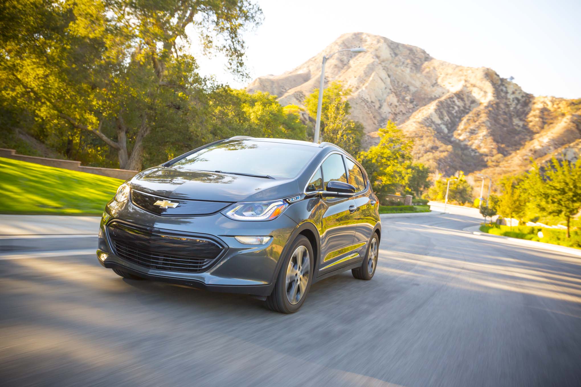 2017-Chevrolet-Bolt-EV-Premier-front-three-quarter-in-motion