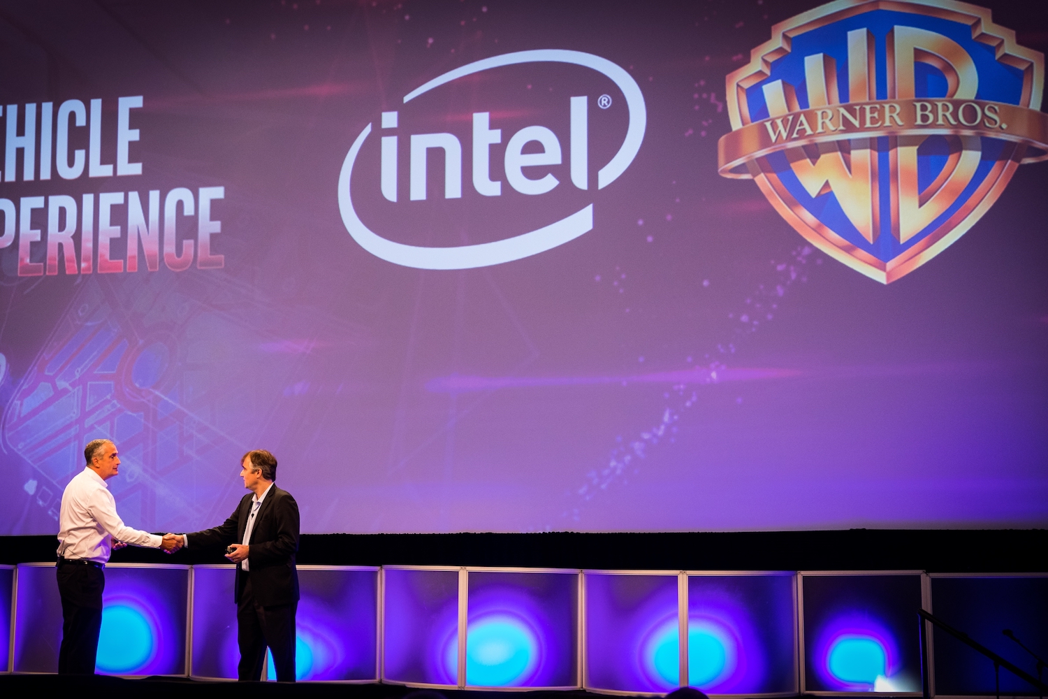 Intel Corporation CEO Brian Krzanich (left) and Thomas Gewecke, Warner Bros. chief digital officer and executive vice president, discuss the companies' plans to collaborate on in-cabin, immersive experiences in autonomous vehicles during Automobility LA on Wednesday, Nov. 29, 2017, in Los Angeles. (Credit: Intel Corporation)